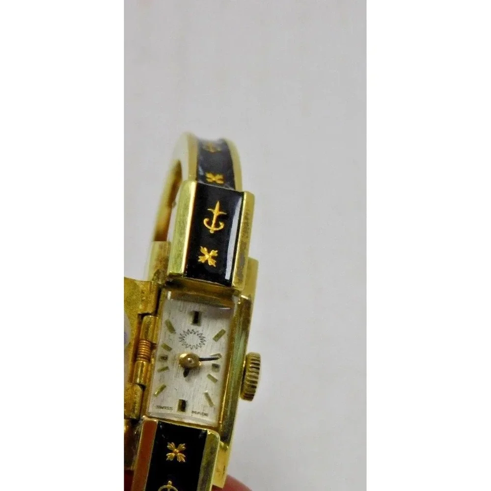 Vtg Swiss Hidden Face Watch Bangle Bracelet Black Enamel Gold Tone JC245